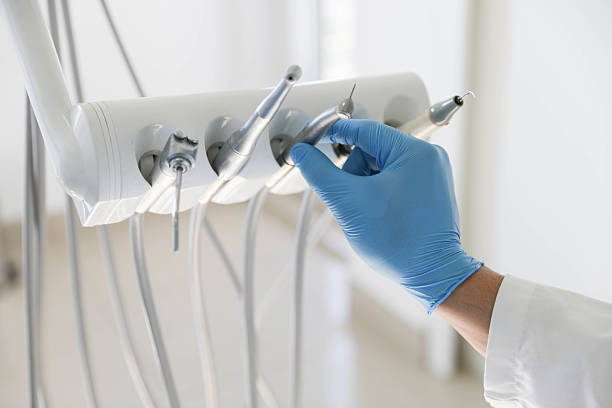 Professional Tooth Extraction technician working in Wrightsville Beach, NC